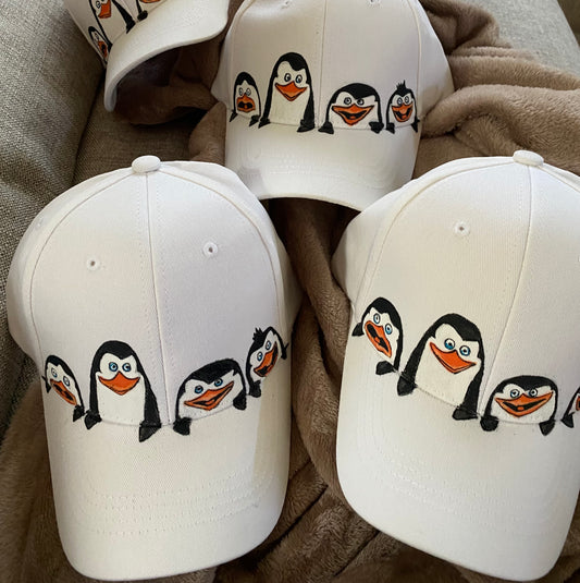 hat -madagascar penguins